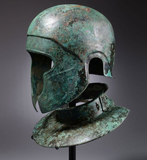 archaicwonder:Samnite Bronze Helmet and Neckguard, C. 450 BCThis imposing helmet is a unique hybrid 