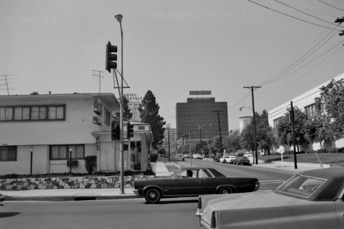 oldshowbiz:1973 - Sunset Blvd at Orange Ave.The building in the left corner is where Hollywood’s mos