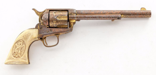 Engraved and gold washed Colt Model 1873 Single Action Army with carved Mexican Eagle ivory grips.fr