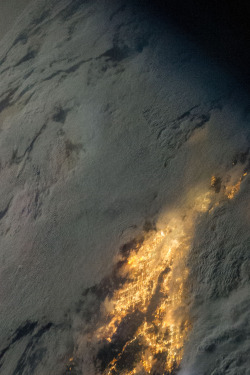 infinity-imagined:  Thunderstorms over Los Angeles, photographed by Astronaut Karen Nyberg from the ISS on July 21st 2013. 