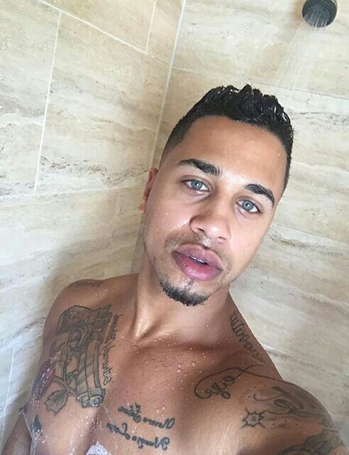 dominicanblackboy:  A cute moment wit Sexy tatted blue eyed rican Blu Rose and that