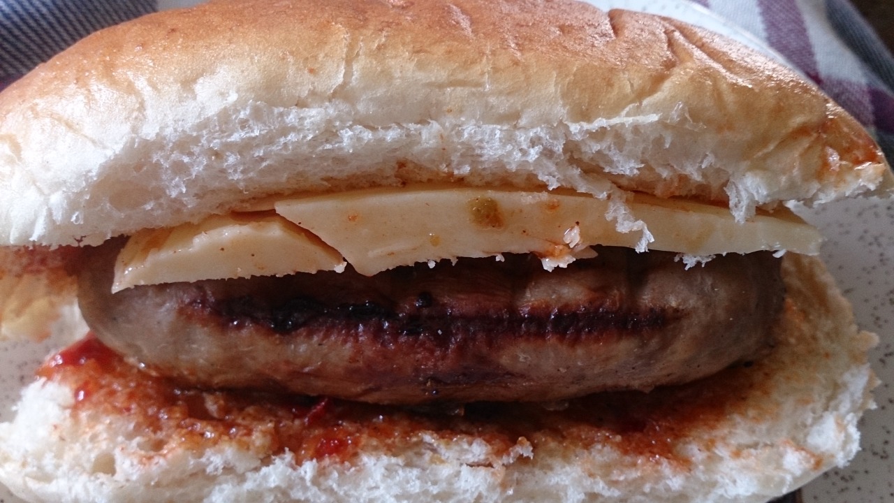 Louisiana Cajun style sausage. Wilkins &amp; Bower bbq sauce. Extra mature cheddar