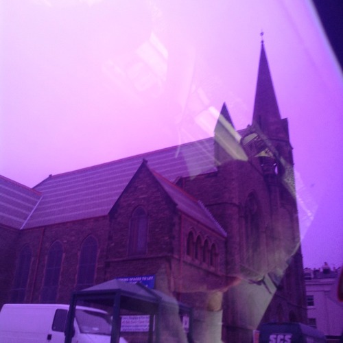 cluts:  a taxi with purple windows