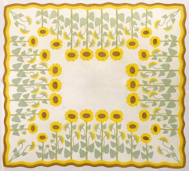 A rectangle textile. Rows of Sunflowers are lined up from the yellow and brown wavy frame around the edge.