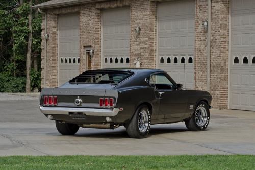 moshrru:      Classic Cars magazine       Today is German-American day in the USA, and to celebrate here’s something suitably American. This Ford Mustang Boss 429 Fastback may lack some of the subtlety of German makes but you’d be invited not to