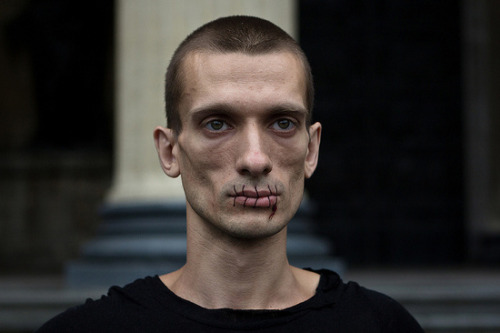 Porn  Russian artist Petr Pavlensky, who sewed photos