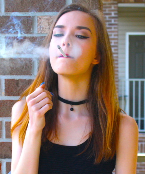 leathersmoke81: Lacey - Dangles a VS120!Look at the way she stares at the cigarette!