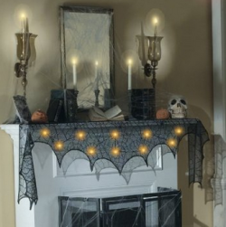 somethingmore999:  Halloween Decorations  Black Lace Cobweb Mantle Halloween Bag of Bones 72 Halloween Picks Flashing Light Up Halloween Decoration Kit Halloween Decoration: Giant Spider Interactive Skeleton in Hammock 