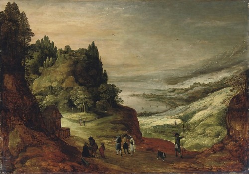 An extensive mountainous river landscape with figures conversing on a track, a village beyond, Joos 