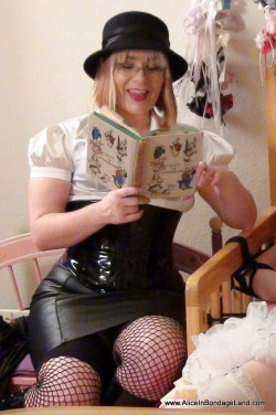 mistressaliceinbondageland: Alice In Wonderland Chapter 2… in bondage! Reading to submissives while they cannot get away is one of my favorite kinky passtimes. There is more to bondage then just sex (but that is fun too). 