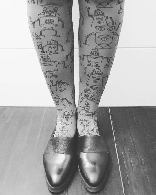 Grey robot tightsHand printed superb quality tights with robot pattern (both side of the leg). Avail