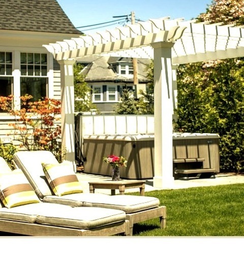 Pergola - PatioMid-sized Elegant Backyard Concrete Paver Patio Photo With A Pergola