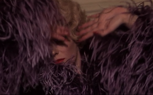 christopherniquet:  delphine seyrig buried in purple ostrich feathers