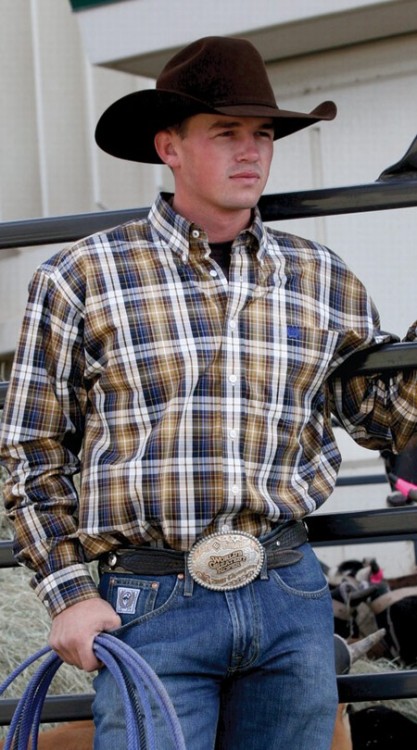 kevincocksucker:  bootsballzspurs:  Cuter than a speckled pup  He is going to have to tie me to the bed and have his way with me before I can confirm, as the belt buckle states, that he is the “World’s Greatest Roper.” That’s a real man, boys.