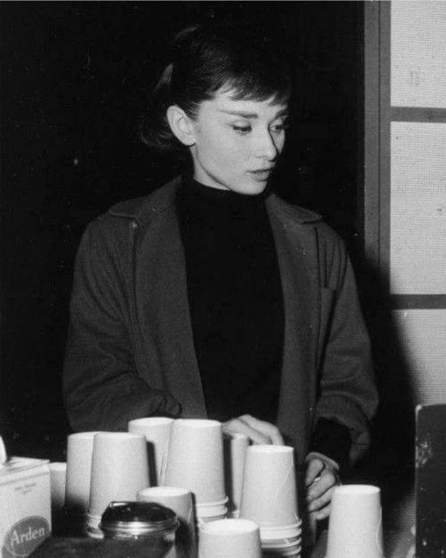 Audrey during a break while filming Funny Face, Paris, 1956.