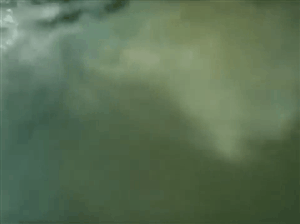 Women Blowing Bubbles Underwater