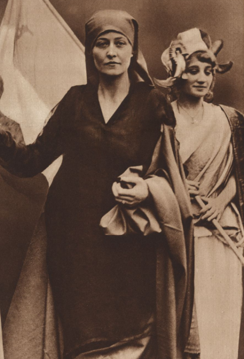 yesterdaysprint:A woman dressed as “Widowed Belgium” in a parade held demanding Lloyd George give wo