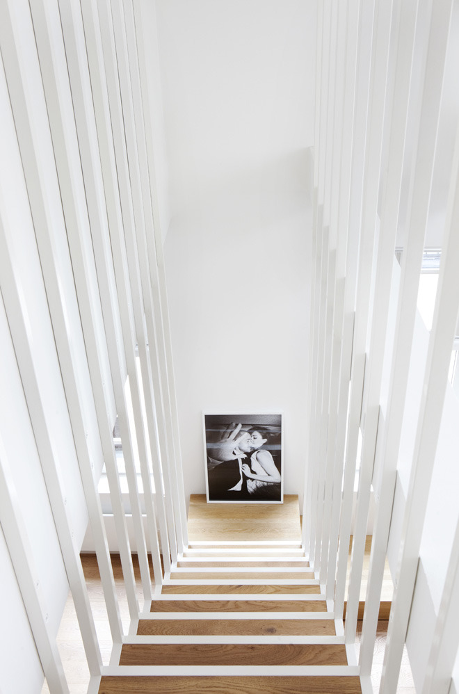 (via Suspended Steel Powder-Coated Staircase Floating Above the Ground)
