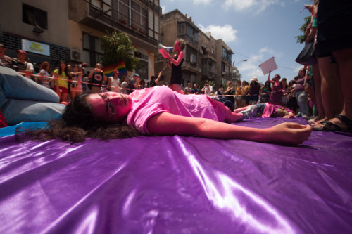 chubbygurl:  occupiedmuslim:  bidyke:  Today, on the Tel Aviv Pride Parade, our queer-anarchist activist group, Mashpritzot, protested against pinkwashing and the “gay” community’s priorities. The group painted themselves pink in protest against