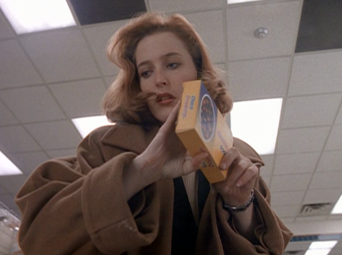 ursulastrausss: Scully looking good while eating choco droppings.