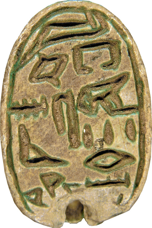 Ancient Egyptian private name seal (beige steatite with blue-green glaze) of one Reni-seneb.  Artist