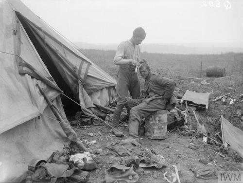 Battle of Bazentin Ridge. Dressing the wounds of a German prisoner near Bernafay Wood, 19th July 191