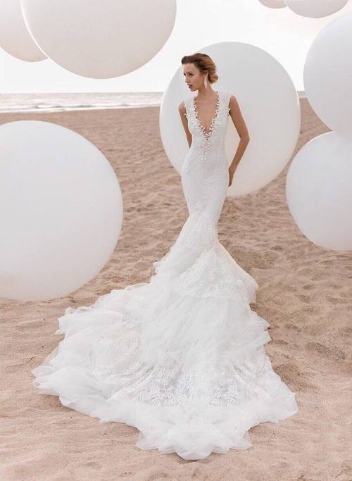 designerbridalroom: Go for a deep V-Neck dress in a figure-flattering mermaid silhouette from Atelie
