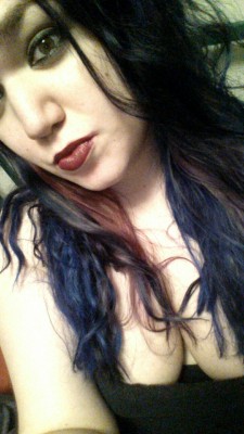 girlfromtx210:  Blue hair. Feeling slutty today  Would love to burst my nuts in your throat!