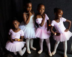 letswakeupworld:  Young ballerinas pose as they prepare to go on stage in Alexandra Township, South Africa.