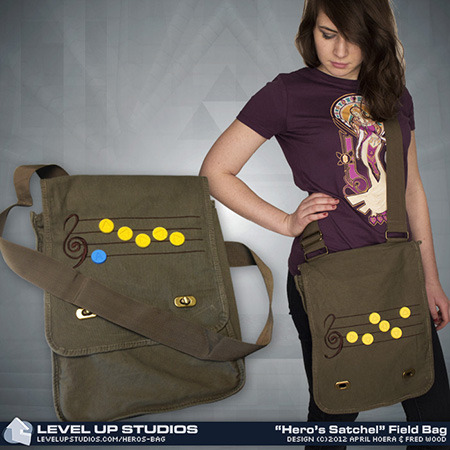 pwnlove:  Musical Hero’s Bag Break out the ocarina, Wind Waker, harp or flute to play your favorite Legend of Zelda tune off these new messenger bags from Level Up Studios. Each messenger bag comes with ten rubber song note pins so you can compose your