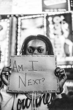 boingboing:  EXCLUSIVE: Photo gallery of Ferguson demonstrators in NYC Photographer Daniel Schaefer captures the grief, anger, and resolve of demonstrators who took to the streets of Manhattan after the announcement that the police officer who killed