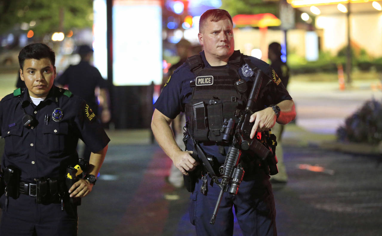 verdigris113:  Police Officers in Dallas bravely secure the city in the wake of a