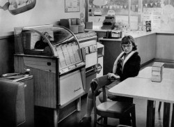 vaticanrust:Girl with a jukebox at a Dairy