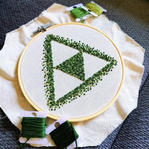 A Triforce out of French knots. Tried to make it look mossy byDelouest