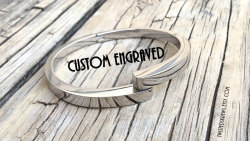 twistedskrews:  BDSM custom ENGRAVED handcuff style slave bracelet discreet submissive   ♥ 316L Silver Surgical Stainless Steel High-polish finish♥ Will fit a wrist size up to 7.25 inches.♥ Sturdy magnetic closer♥ Will NOT rust, tarnish or fade♥Suitable