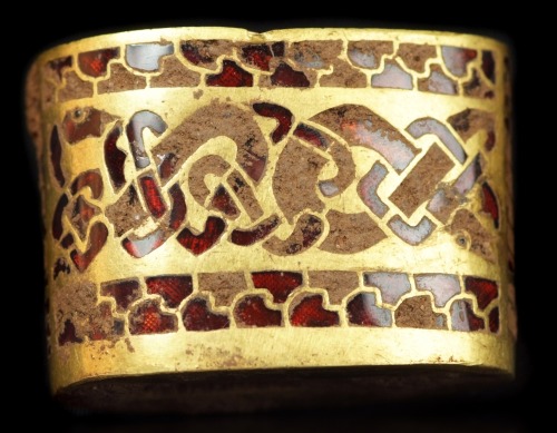 8th century AD, Anglo-Saxon sword hilt fitting – gold with gemstone inlay of garnet cloisonné. From 