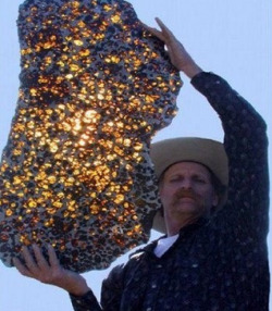twolou:  sixpenceee:  The Fukang Meteorite  The Fukang meteorite, believed to be some 4.5 billion years old, which is as ancient as Earth itself, was unearthed near a town of the same name in China, in 2000. It is a pallasite, a type of meteorite with