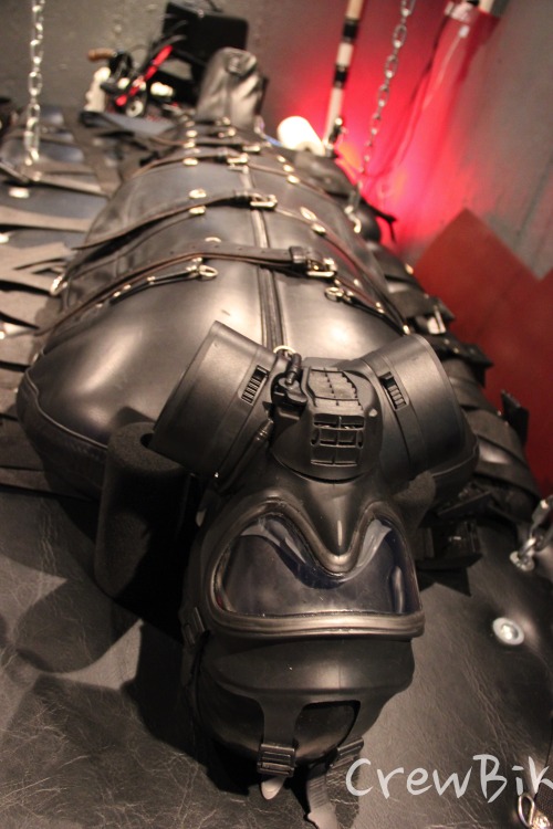 crewbiker:  Rubber covered subject secured in Mr. S Leather Sleepsack and GSR. 