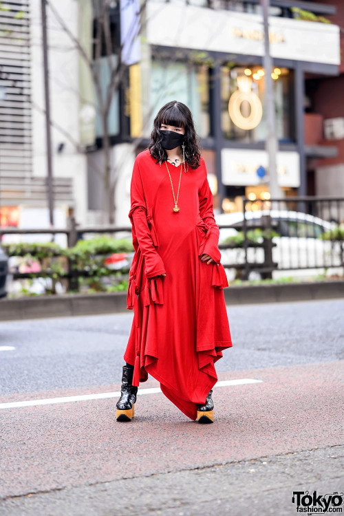 Japanese artist Miyu on the street in Harajuku wearing a ribbon dress by Japanese fashion brand LIMI