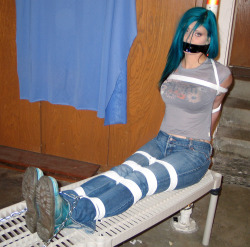 gaghermouth:  Sitting pole tie and gagged, dont she look sweet with that cleavage? I think my hands will be busy soon :)