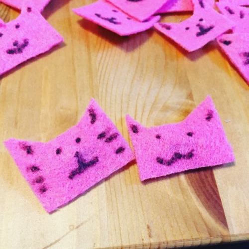 We made “kitty” hat swaps for Girl Scout camp after Rosie saw the knit pussyhat brooches/pins on Rav