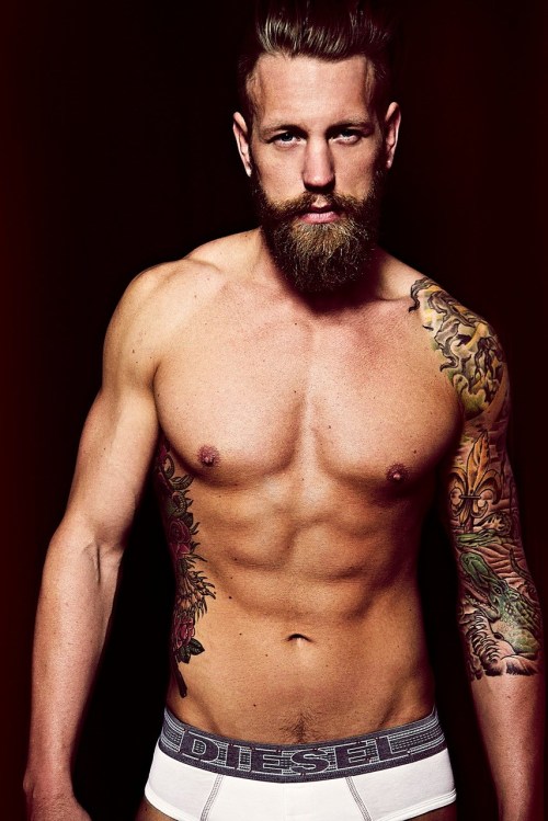 ofmodelsandmen:  Tattooed hunk Adam Sperandio is photographed by Charles Quiles  