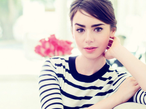 Lily Collins Lily Collins Lily Jane Collins (born 18 March 1989) is a British-American actress and m