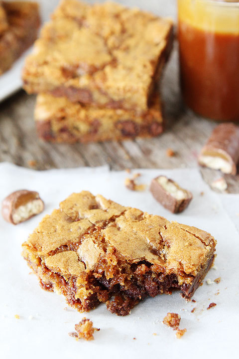bakeddd - twix caramel cookie barsclick here for recipe