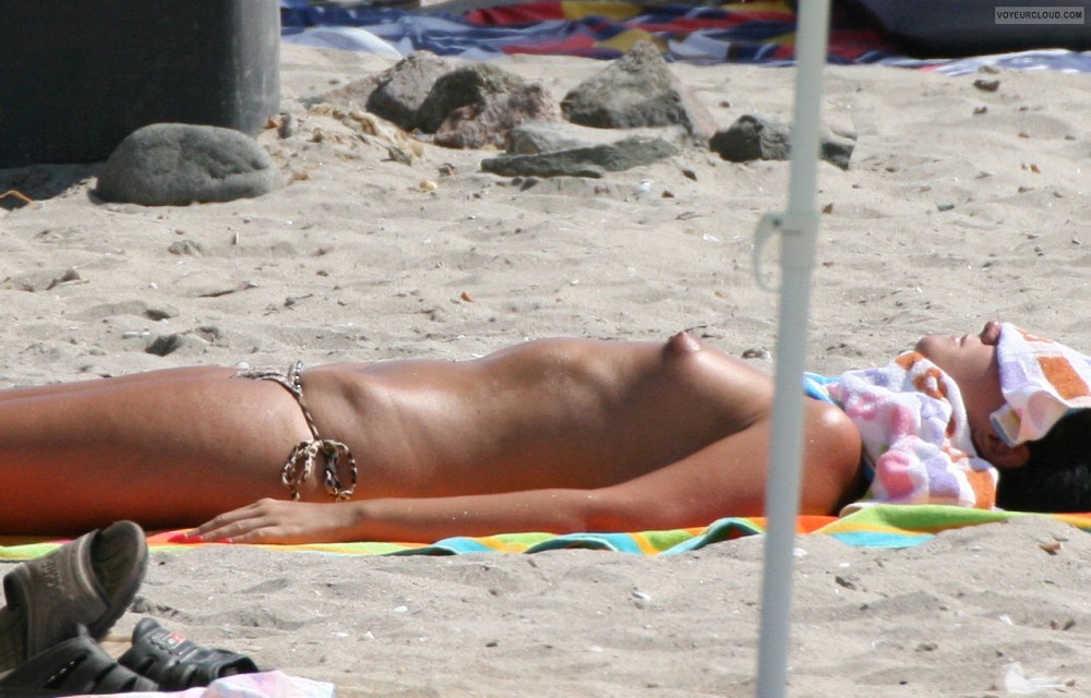 Puffy nipples on the topless beach