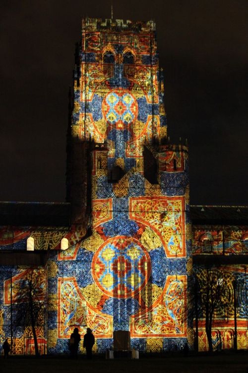 sacrismoon:From http://www.thejournal.co.uk/news/thousands-head-durham-lumiere-festival-6302997 “The Crown of Light” - projections featuring the Lindisfarne Gospels are illuminated upon Durham Cathedral