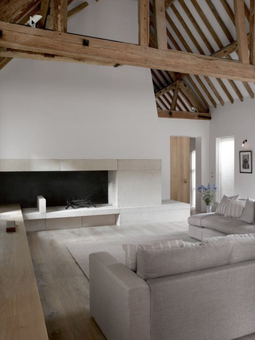 {Appreciating the integrity of the old, with the warm minimalism of the new. That gliding staircase 