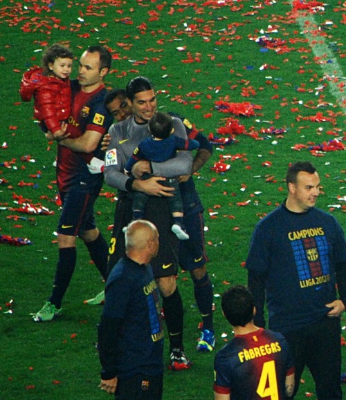 Dani Alves playing peek-a-boo with Nathan Pinto at the La Liga celebration