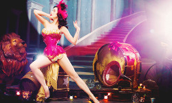 :  Dita Von Teese in a circus-themed photoshoot