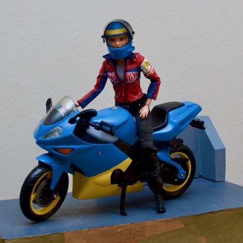 Barbie With Motorcycle‘Made To Move’ Barbie with 90s Nascar jacket and racing helmet on modified Bat
